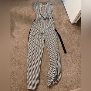 Striped, flattering, jumpsuit. White & navy blue with waist tie.